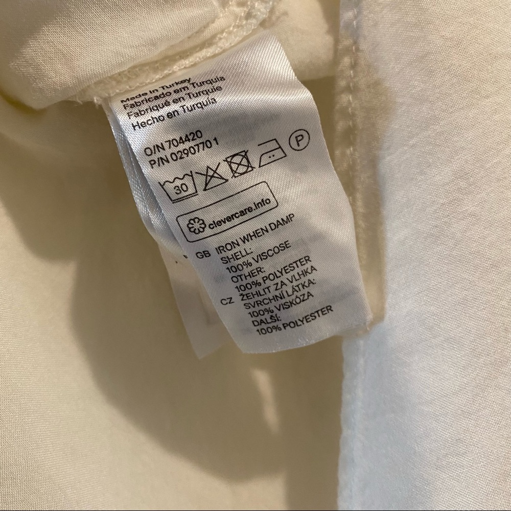H&M cream short sleeve blouse with ruffle sleeves size 2 - Picture 5 of 5